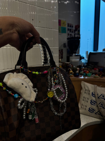 Tamagotchi-inspired bag charm