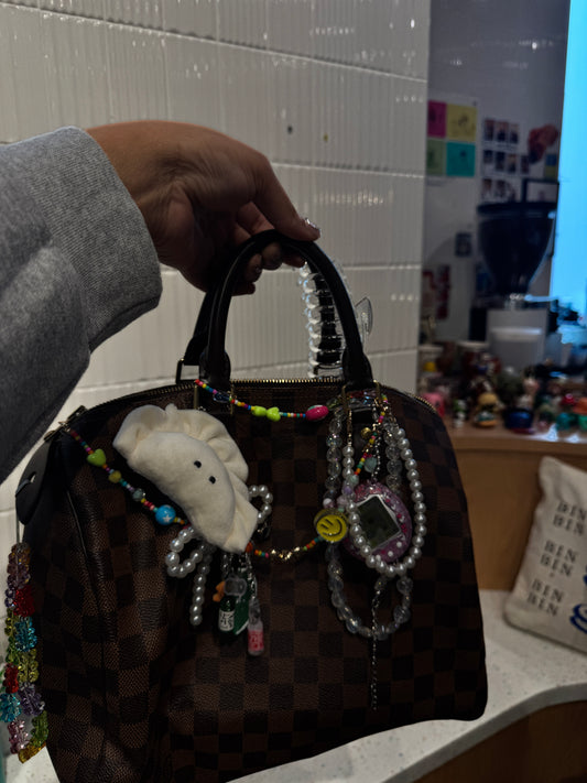 Tamagotchi-inspired bag charm