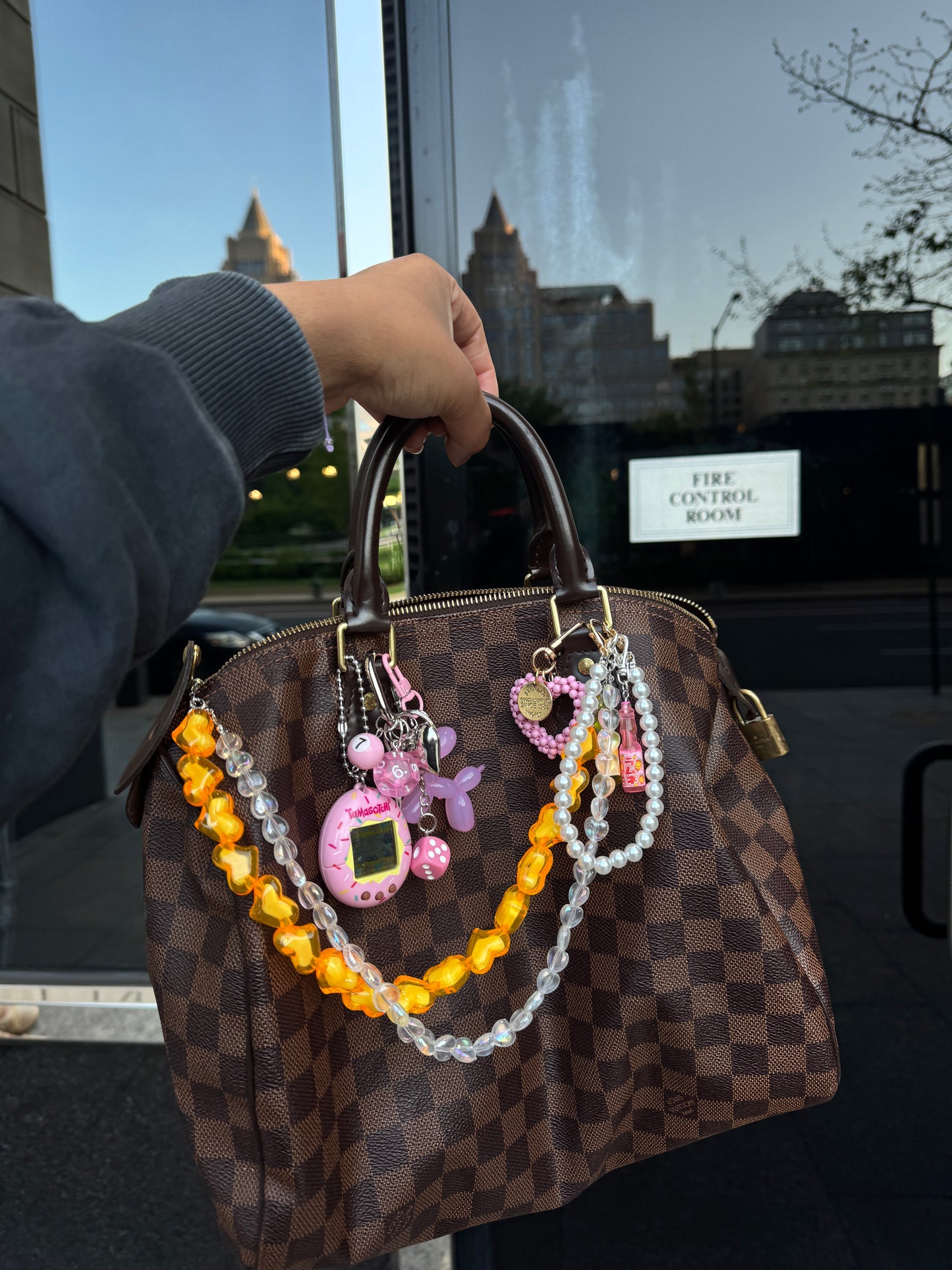 Tamagotchi-inspired bag charm pink theme
